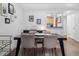 Modern dining room featuring a dark wood table and artwork at 800 N Pearl St # 709, Denver, CO 80203