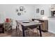 Elegant dining room featuring a sophisticated bar cart, modern wood table, and stylish seating at 800 N Pearl St # 709, Denver, CO 80203