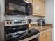 Functional kitchen featuring stainless steel appliances, granite countertops, and ample storage space at 800 N Pearl St # 709, Denver, CO 80203