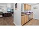 Kitchen boasts stainless steel appliances, granite countertops, and scenic views from the adjacent living area at 800 N Pearl St # 709, Denver, CO 80203