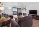 Spacious living room featuring stylish furniture, a fireplace, and a walk-out balcony at 800 N Pearl St # 709, Denver, CO 80203