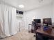 Home office with a washer and dryer, featuring a large desk and a comfortable workspace at 800 N Pearl St # 709, Denver, CO 80203