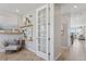Inviting hallway with stylish decor and natural light, with an office visible at 13334 Blue Amber Ct, Parker, CO 80134
