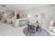 Open-concept living room featuring modern decor, a console table, and a seating area at 13334 Blue Amber Ct, Parker, CO 80134