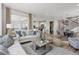 Open-concept living space with a dining area, stylish decor, and seamless flow at 13334 Blue Amber Ct, Parker, CO 80134