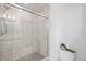 Bright bathroom featuring a glass enclosed shower with modern tile and updated shower fixtures at 18143 E 104Th Way, Commerce City, CO 80022