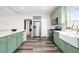 Open kitchen with stainless steel appliances and an island with a breakfast bar at 18143 E 104Th Way, Commerce City, CO 80022
