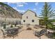 Relax in the backyard with a firepit and seating where you can enjoy the outdoors at 1795 Mountain Creek Dr, Georgetown, CO 80444