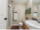 Bathroom featuring glass-enclosed shower, neutral paint, and stacked towels at 1795 Mountain Creek Dr, Georgetown, CO 80444