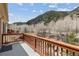 Enjoy the views from this outdoor deck of the surrounding neighborhood and mountain views at 1795 Mountain Creek Dr, Georgetown, CO 80444