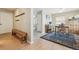 Dining area adjacent to hallway with wood table and chairs, wood flooring, and neutral paint at 1795 Mountain Creek Dr, Georgetown, CO 80444