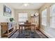 Cozy dining area featuring a wooden table, chairs, and ample cabinet storage for tableware at 1795 Mountain Creek Dr, Georgetown, CO 80444