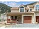 Charming two-story townhouse with covered porch and attached garage in a mountain setting at 1795 Mountain Creek Dr, Georgetown, CO 80444
