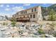 Exterior view of home with a private deck and access to the mountains at 1795 Mountain Creek Dr, Georgetown, CO 80444