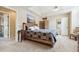 Main bedroom featuring high ceilings, a comfortable bed, and neutral paint at 1795 Mountain Creek Dr, Georgetown, CO 80444