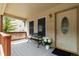 Welcoming covered porch with a bench, tasteful decor, and a view of the neighborhood at 1795 Mountain Creek Dr, Georgetown, CO 80444