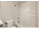 Well-lit bathroom with a tub/shower combo and clean fixtures at 1810 Irving St # 4, Denver, CO 80204