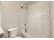 Clean, tiled bathroom featuring a soaking tub and modern fixtures for relaxation and comfort at 1810 Irving St # 4, Denver, CO 80204