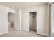 Spacious bedroom with neutral tones, a closet with sliding doors, and ample natural light at 1810 Irving St # 4, Denver, CO 80204