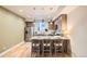 Bright kitchen with stainless steel refrigerator and white countertops, perfect for any home chef at 1810 Irving St # 4, Denver, CO 80204