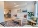 Inviting living room with a comfortable sofa, a rustic wooden coffee table, and tasteful decor at 1810 Irving St # 4, Denver, CO 80204