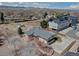Stunning aerial view of the home's backyard, adjacent to new construction and community garden plots at 7890 W 43Rd Pl, Wheat Ridge, CO 80033
