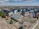 Bird's eye view showcases the home with surrounding landscaping, community gardens, and modern townhome developments at 7890 W 43Rd Pl, Wheat Ridge, CO 80033