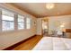 Bedroom featuring hardwood floors, a work desk with chair, and plenty of natural light at 7890 W 43Rd Pl, Wheat Ridge, CO 80033