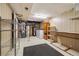 The basement utility room with a washer and dryer and storage shelves at 8137 Vanguard Dr, Denver, CO 80221