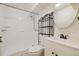 A full basement bathroom with a shower, toilet, vanity, and medicine cabinet at 8137 Vanguard Dr, Denver, CO 80221