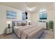 Finished basement bedroom with neutral tones, cozy carpeting, and stylish decor at 8137 Vanguard Dr, Denver, CO 80221