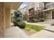 Landscaped front entrance with walkway to the units at 524 E Hinsdale Ave, Littleton, CO 80122