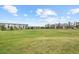 Expansive community green space provides a beautiful view of the surrounding buildings at 524 E Hinsdale Ave, Littleton, CO 80122