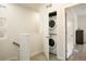 Convenient laundry area with a stacked washer and dryer at 524 E Hinsdale Ave, Littleton, CO 80122