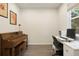 Spacious office with a piano and desk setup, bathed in natural light at 524 E Hinsdale Ave, Littleton, CO 80122