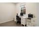 Home office with a white desk and storage, perfect for remote work at 524 E Hinsdale Ave, Littleton, CO 80122