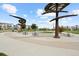 Community park area with shaded seating and green space for relaxing at 524 E Hinsdale Ave, Littleton, CO 80122