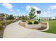 Community playground with a slide, surrounded by trees and landscaping offering a recreational space for families at 524 E Hinsdale Ave, Littleton, CO 80122