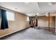 The basement has rubber flooring and a workout space at 714 S Tabor St, Elizabeth, CO 80107