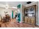 Spacious living and dining area featuring wood floors and classic wooden furniture at 714 S Tabor St, Elizabeth, CO 80107