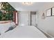 Comfortable bedroom featuring carpet flooring and closet space at 502 Green Mountain Dr, Erie, CO 80516