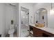 Bathroom features a walk-in shower, modern vanity with unique sink and stylish fixtures at 245 N County Highway 67, Sedalia, CO 80135
