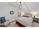 Bright bedroom with vaulted ceiling, natural light, and modern decor at 245 N County Highway 67, Sedalia, CO 80135