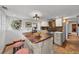 Charming kitchen with a copper-topped island, unique backsplash and ample counter space at 245 N County Highway 67, Sedalia, CO 80135