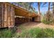 Rustic log structure provides outdoor wood storage at 245 N County Highway 67, Sedalia, CO 80135