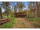 Outdoor log storage area with wood and rustic log walls at 245 N County Highway 67, Sedalia, CO 80135