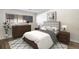 Comfortable bedroom with plush bedding, stylish furniture, and ample natural light at 500 Manhattan Dr # B1, Boulder, CO 80303