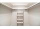 Organized walk-in closet with shelving and rods for ample storage space at 500 Manhattan Dr # B1, Boulder, CO 80303
