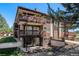 Charming building with balconies, lush landscaping, and outdoor living space at 500 Manhattan Dr # B1, Boulder, CO 80303