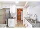 Modern kitchen featuring white cabinets, stainless steel appliances, and stylish countertops at 500 Manhattan Dr # B1, Boulder, CO 80303